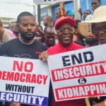 Tensions Rise as Protesters and Counter-Protesters Clash Under Ikeja Bridge on Democracy Day