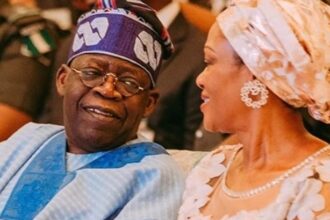 Tinubu Jokes, Calls First Lady 'Iya Alakara' Amid Backlash Over Trading Remarks